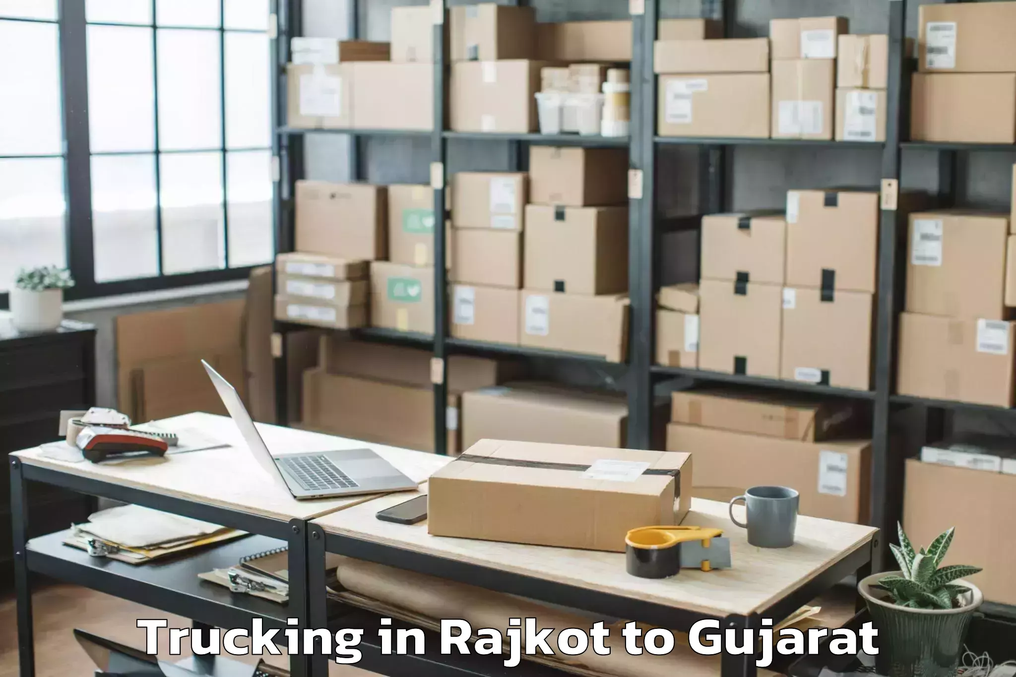 Top Rajkot to Uchchhal Trucking Available